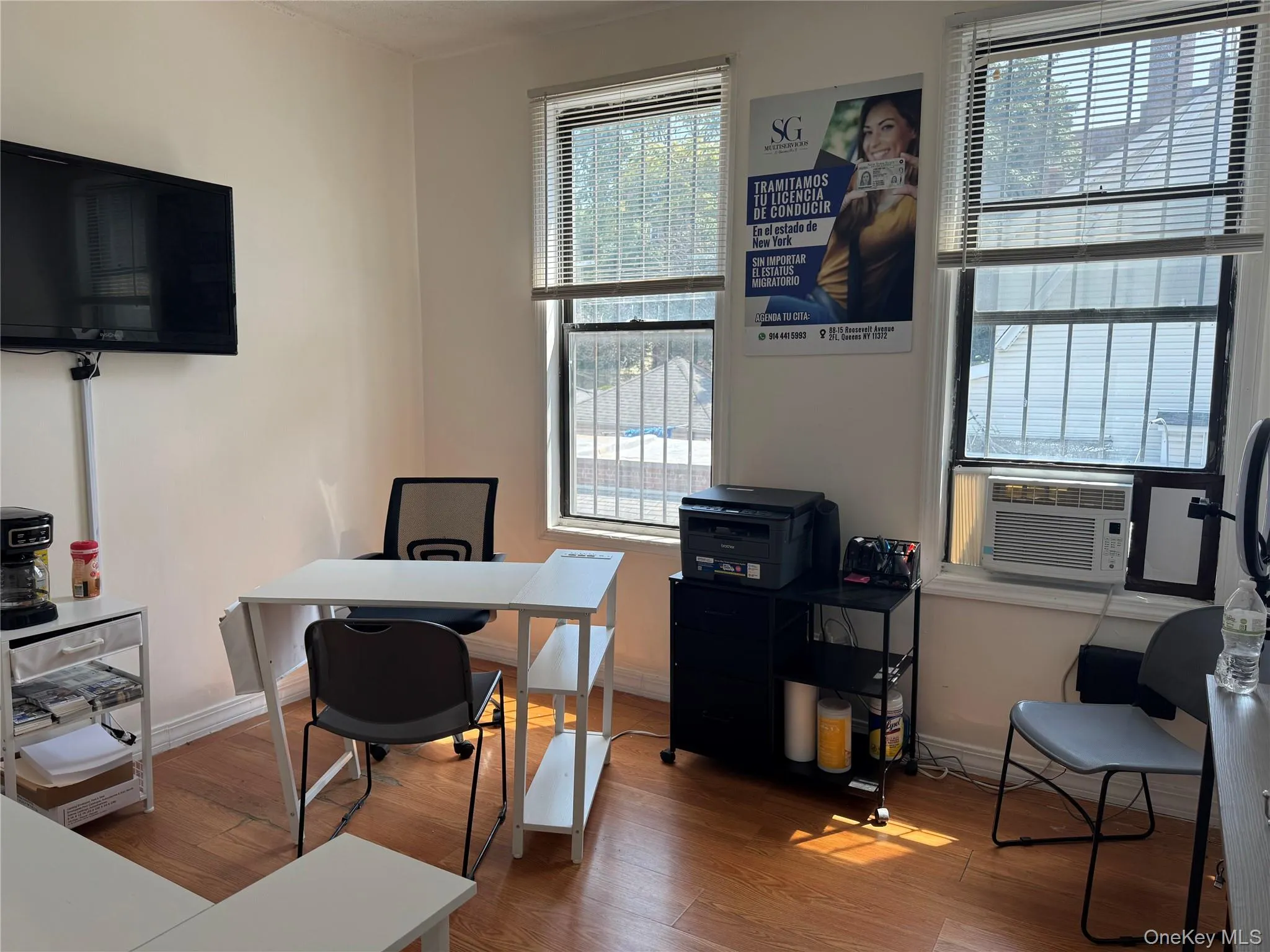 Office with wood finished floors and healthy amount of natural light Office with wood finished floors and healthy amount of natural light