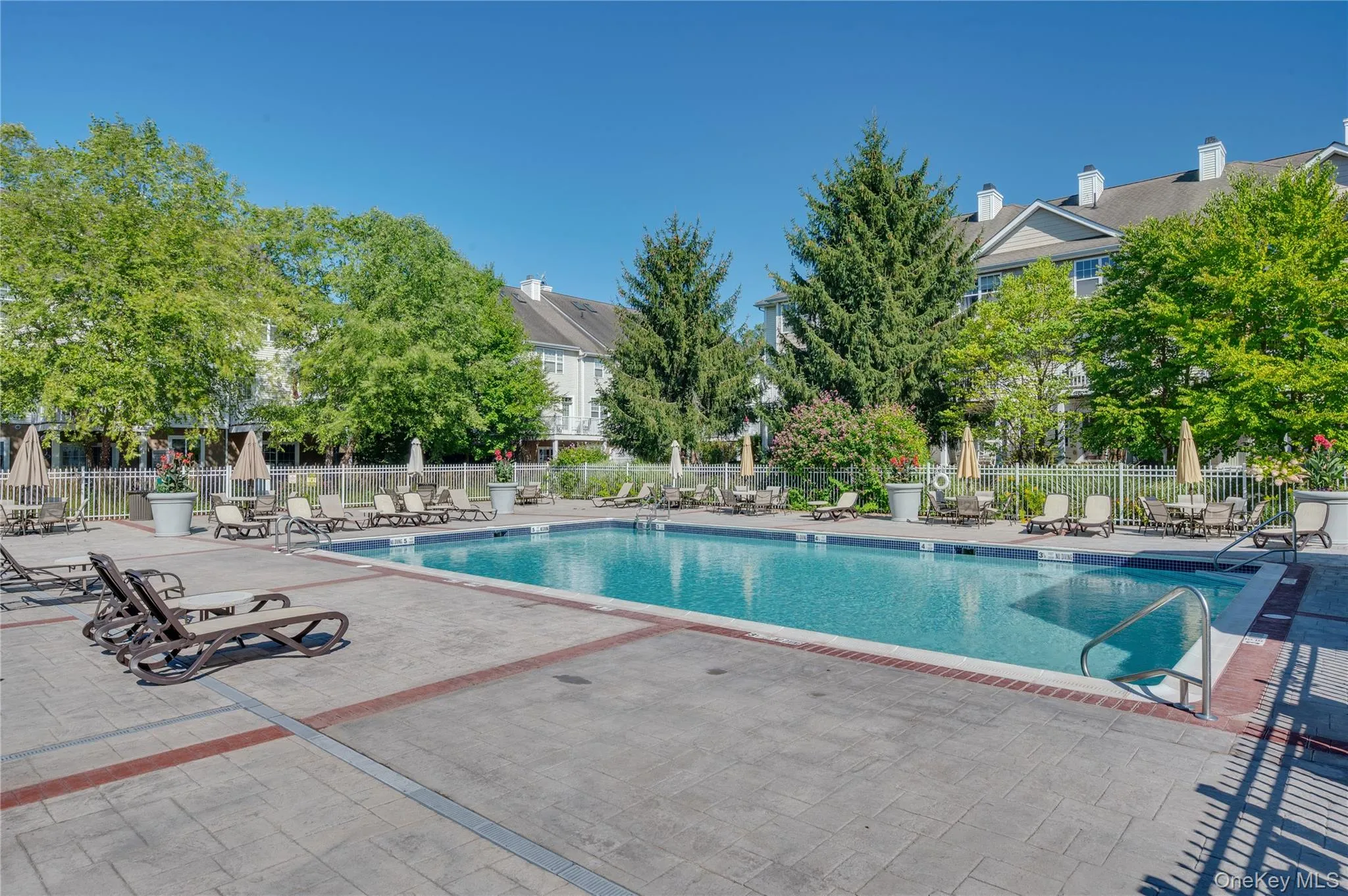 Community pool featuring a patio Community pool featuring a patio