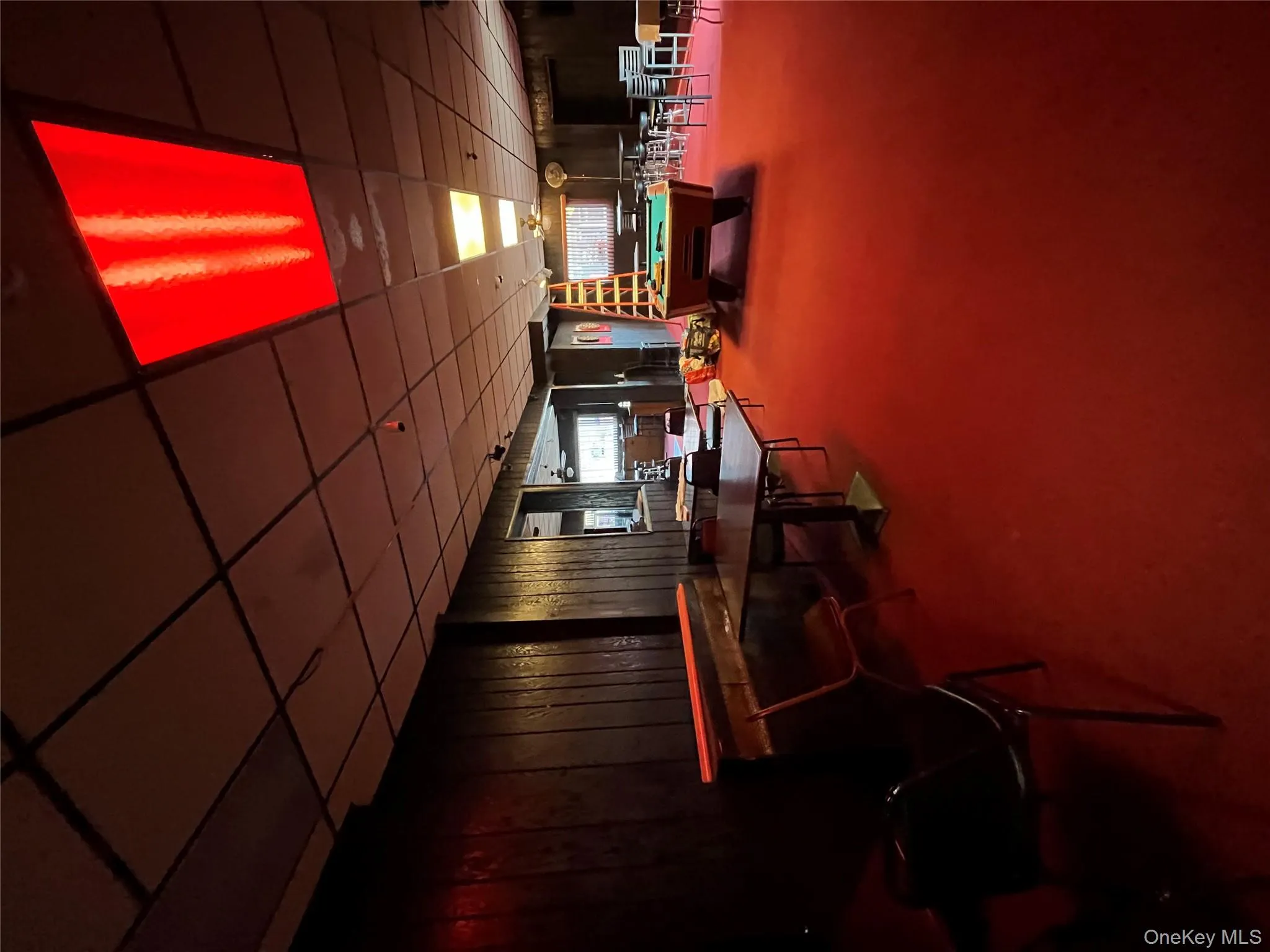 Game room featuring a drop ceiling, carpet flooring, billiards, and wooden walls Game room featuring a drop ceiling, carpet flooring, billiards, and wooden walls