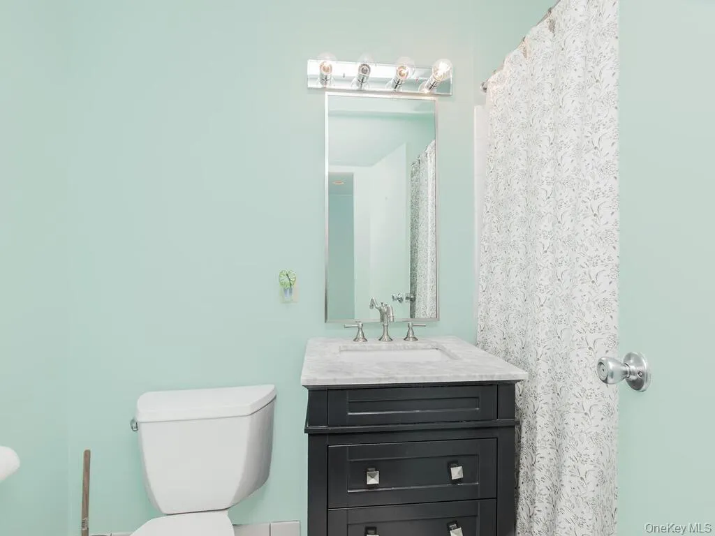 Full bath featuring vanity and a shower 2nd floor Full bath featuring vanity and a shower 2nd floor