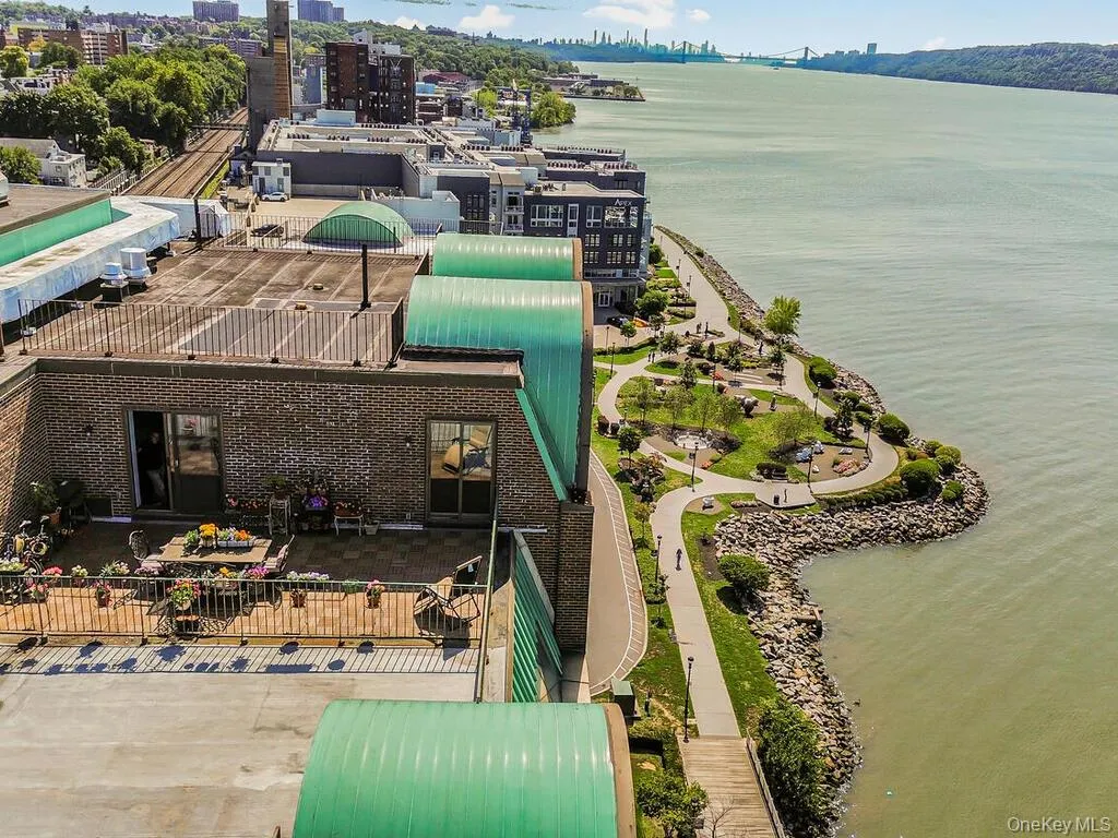 View of urban area featuring a nearby body of water View of urban area featuring a nearby body of water
