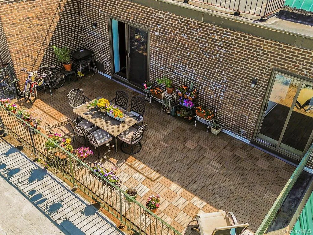 View of patio featuring outdoor dining area and grilling area View of patio featuring outdoor dining area and grilling area