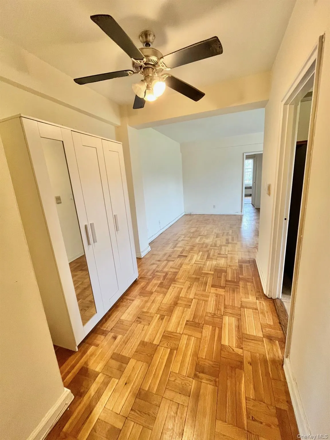 Hallway featuring baseboards Hallway featuring baseboards