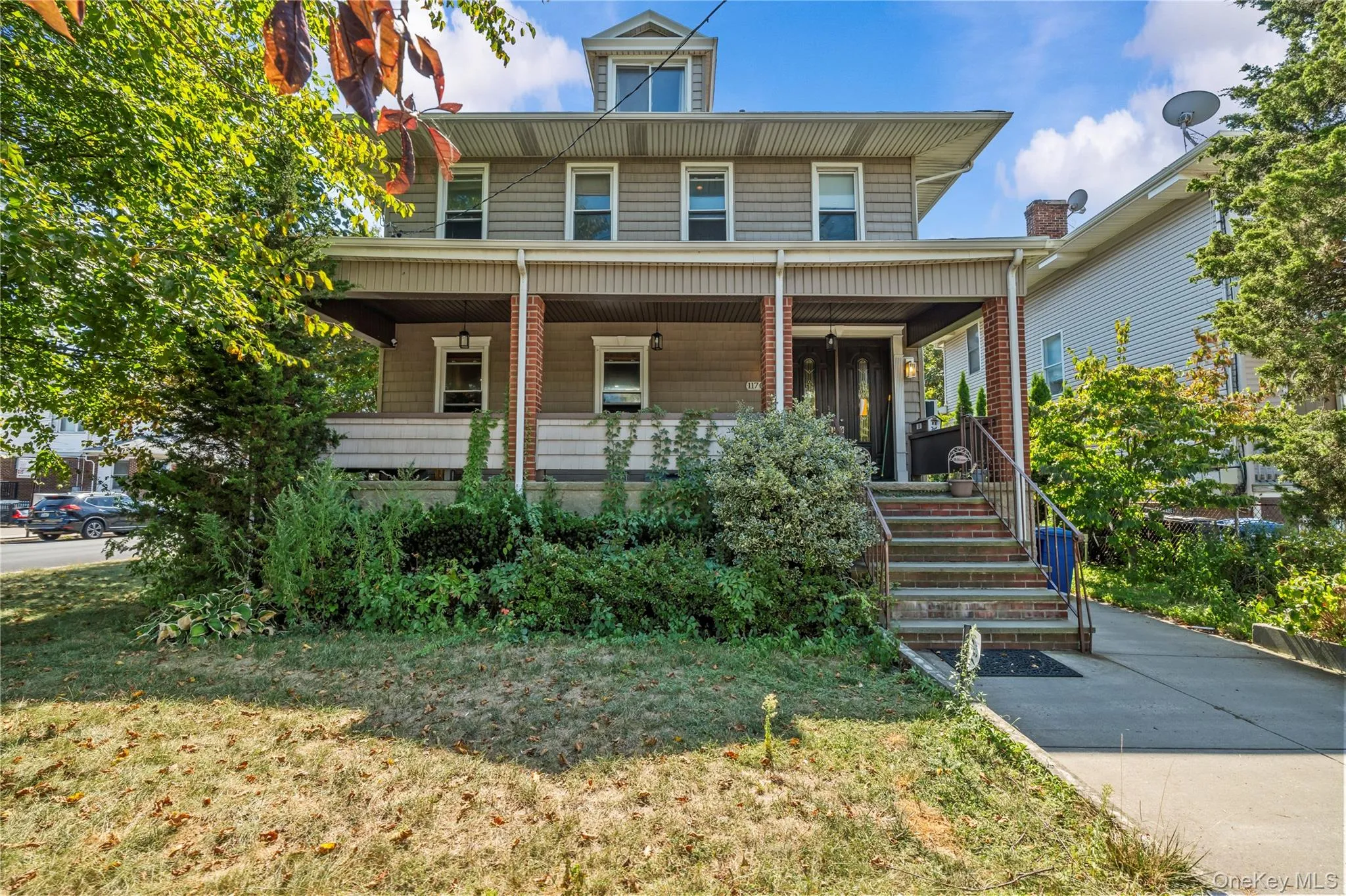 American foursquare style home with a porch American foursquare style home with a porch