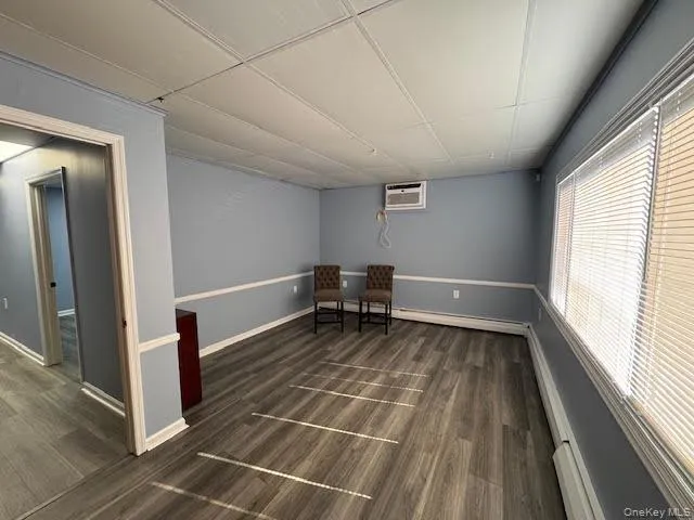 Reception/room with large window. Reception/room with large window.