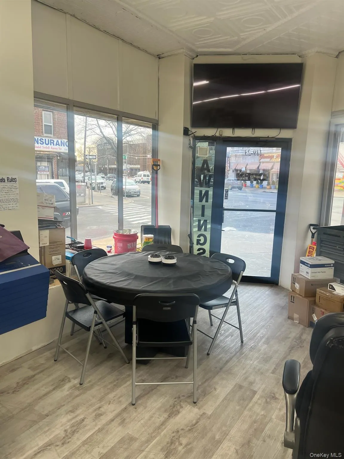 Dining area featuring light wood finished floors and an ornate ceiling Dining area featuring light wood finished floors and an ornate ceiling