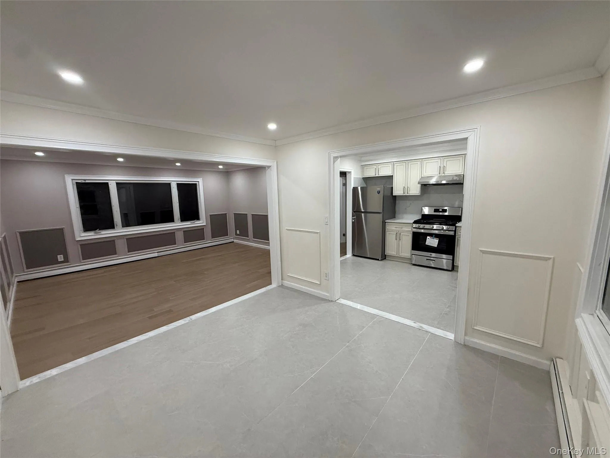 Dining Room with views into the Living Room and Kitchen Dining Room with views into the Living Room and Kitchen