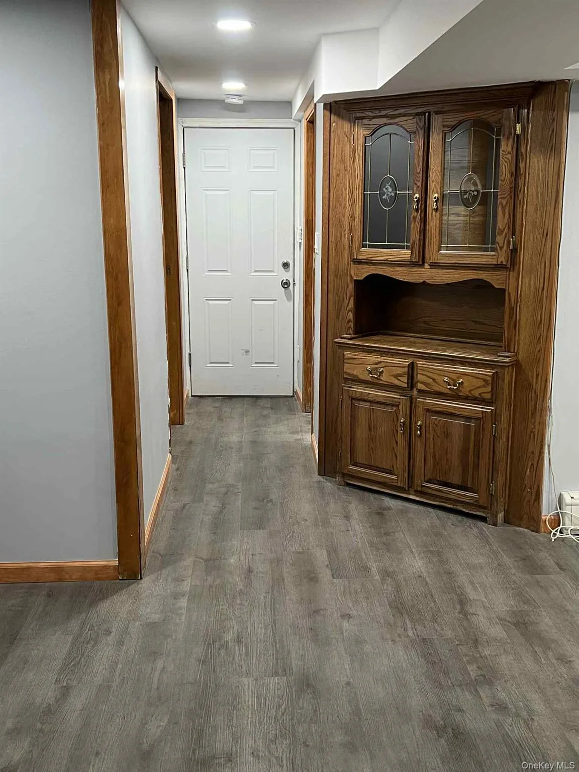 Corridor featuring baseboards Corridor featuring baseboards