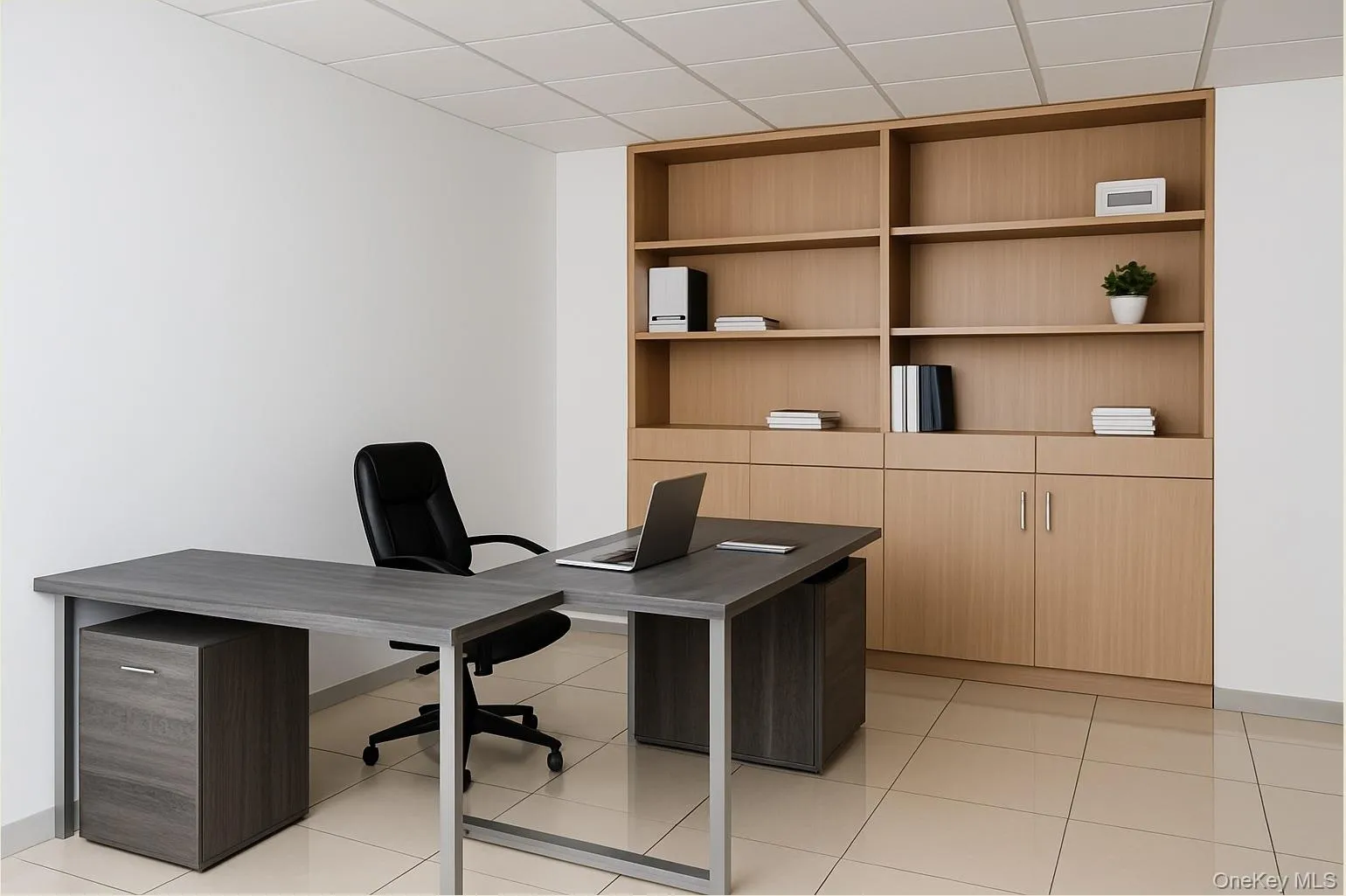 Office area with light tile patterned floors, a paneled ceiling, and built in shelves Office area with light tile patterned floors, a paneled ceiling, and built in shelves