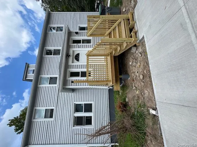 Back of property with a wooden deck Back of property with a wooden deck
