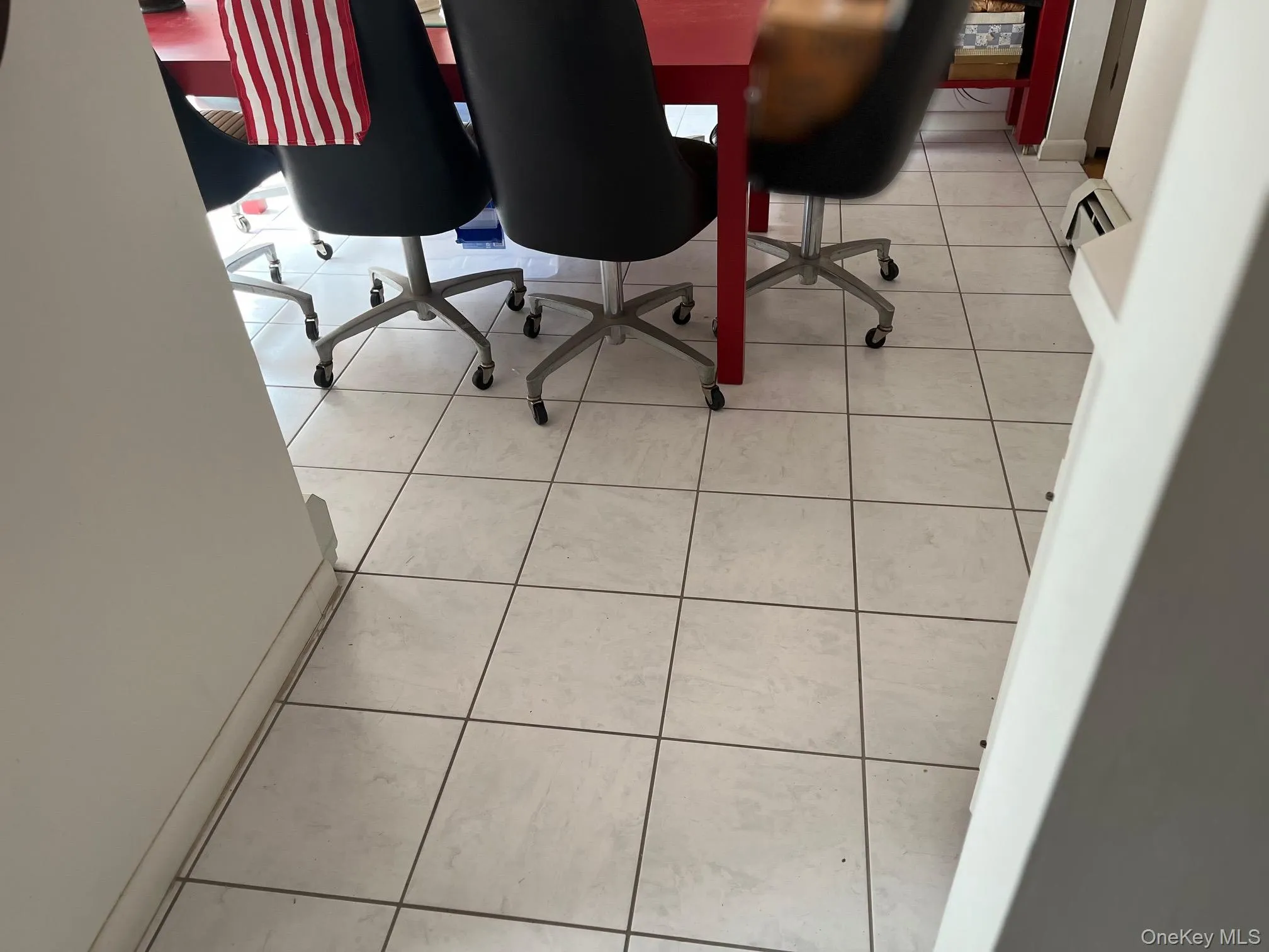 Office area featuring light tile patterned flooring Office area featuring light tile patterned flooring