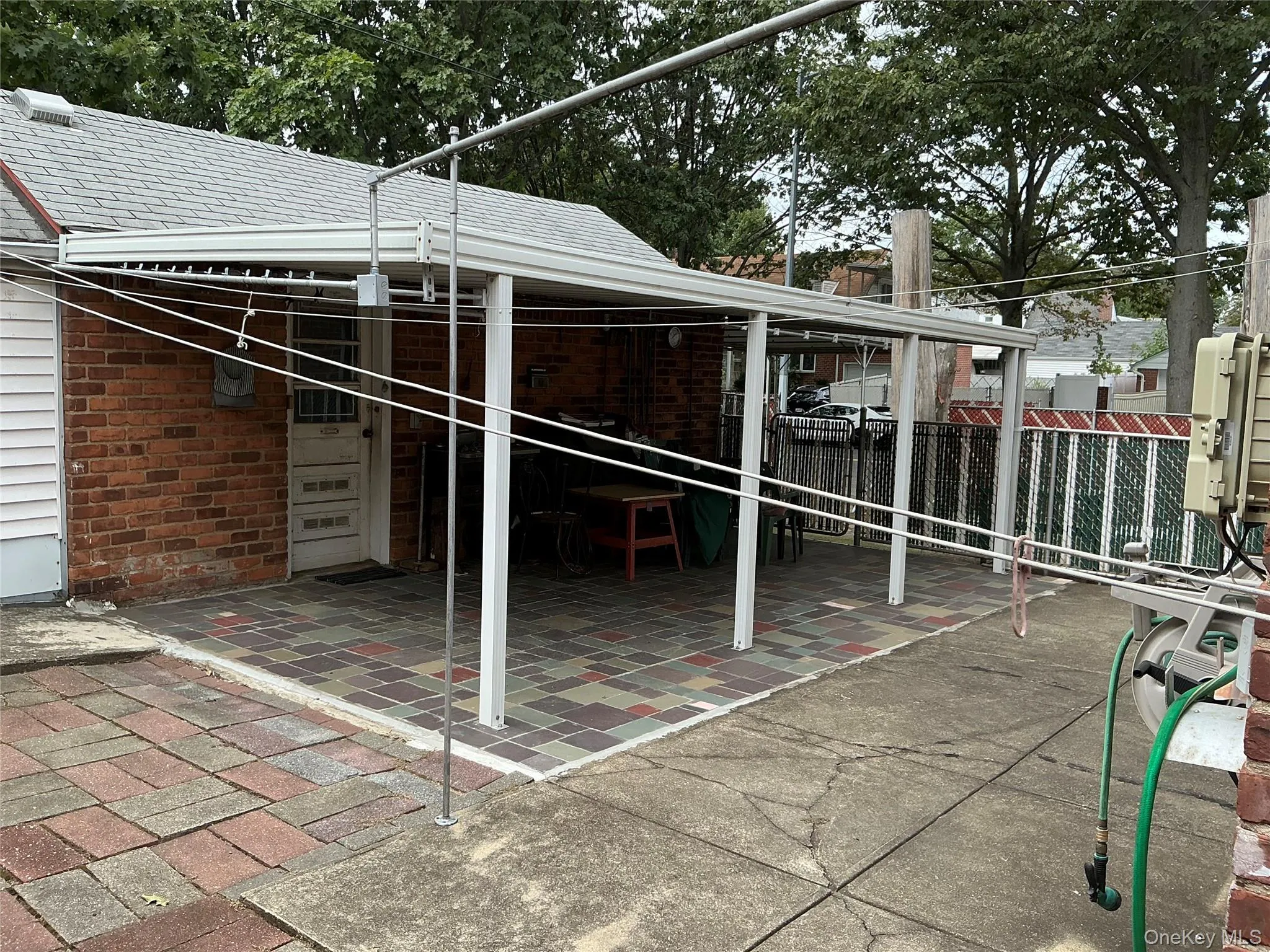 View of covered patio off garage View of covered patio off garage