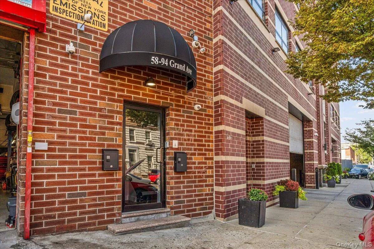 Property entrance with brick siding Property entrance with brick siding