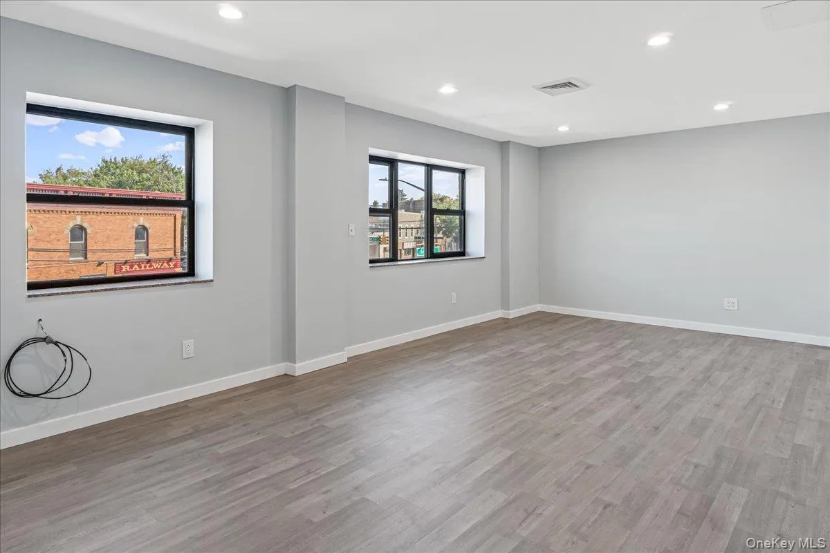 Unfurnished room featuring recessed lighting and light wood-style flooring Unfurnished room featuring recessed lighting and light wood-style flooring