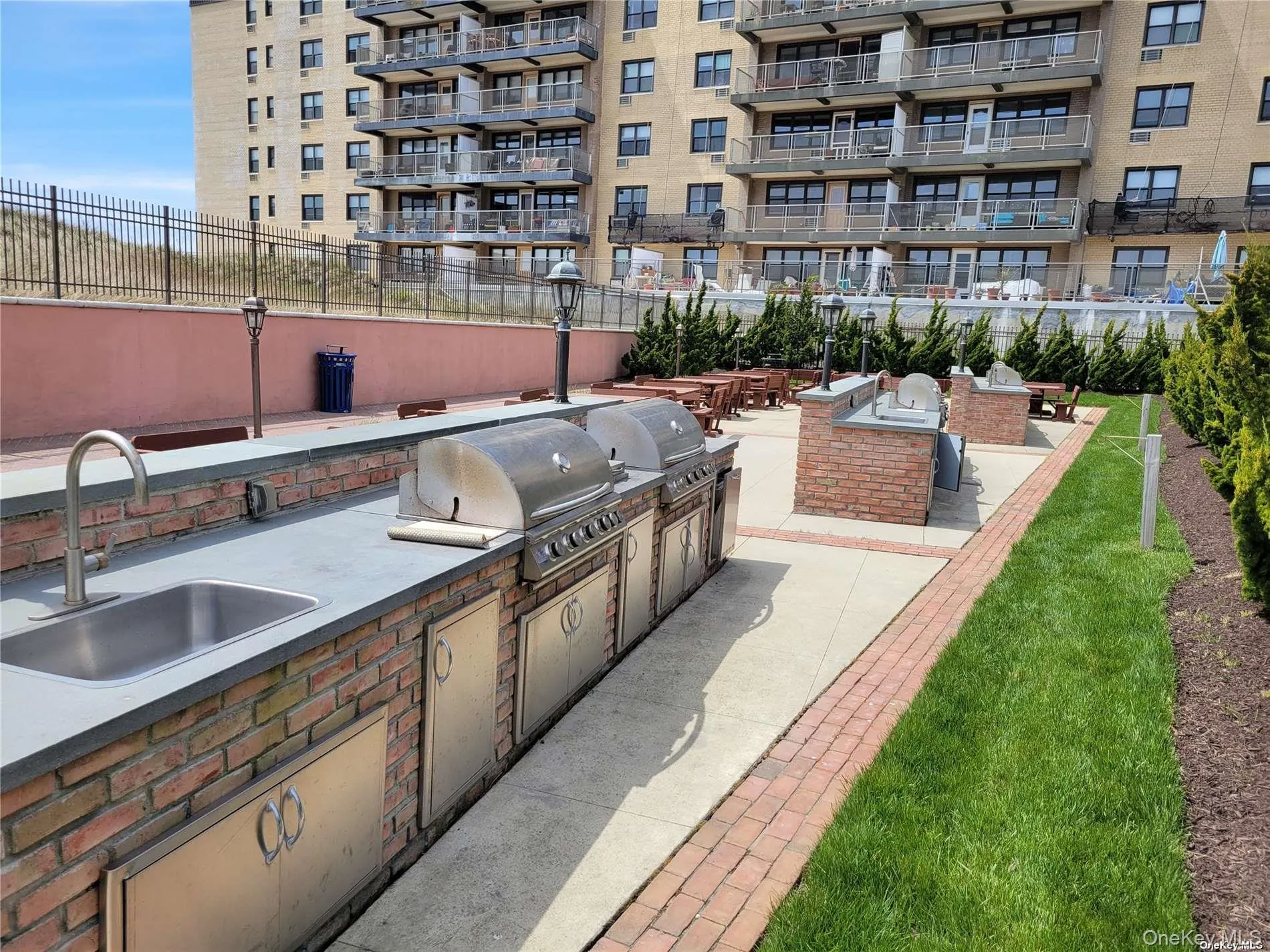 View of patio / terrace featuring an outdoor kitchen and a sink View of patio / terrace featuring an outdoor kitchen and a sink