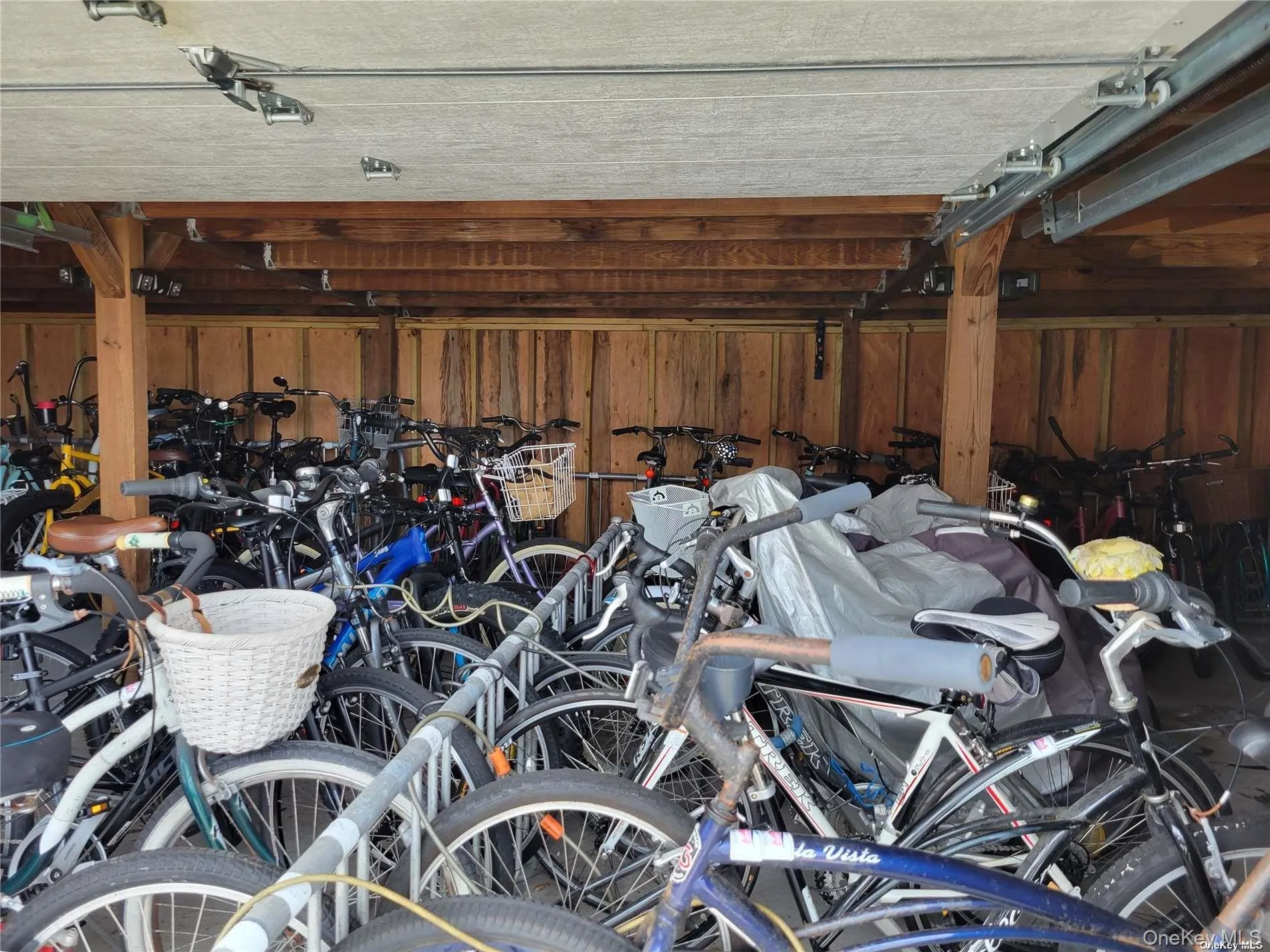 Garage featuring wood walls Garage featuring wood walls