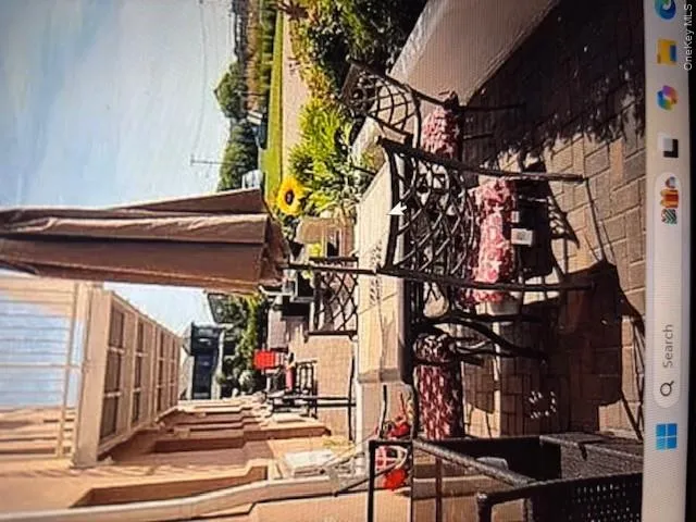 Patio / terrace featuring outdoor dining space and a patio Patio / terrace featuring outdoor dining space and a patio