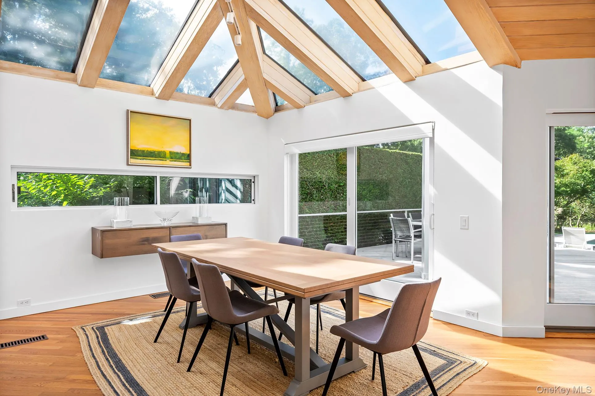 Dining room with wood flooring Dining room with wood flooring