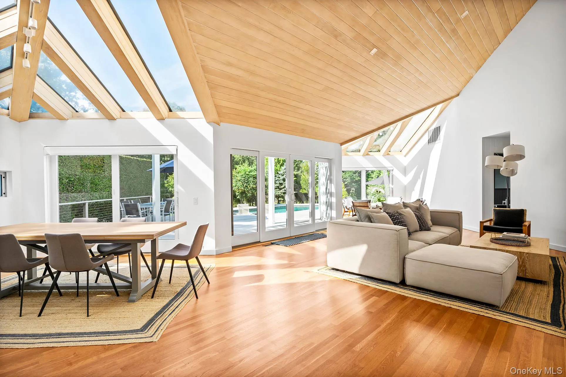 Interior featuring a skylight, high vaulted celings Interior featuring a skylight, high vaulted celings
