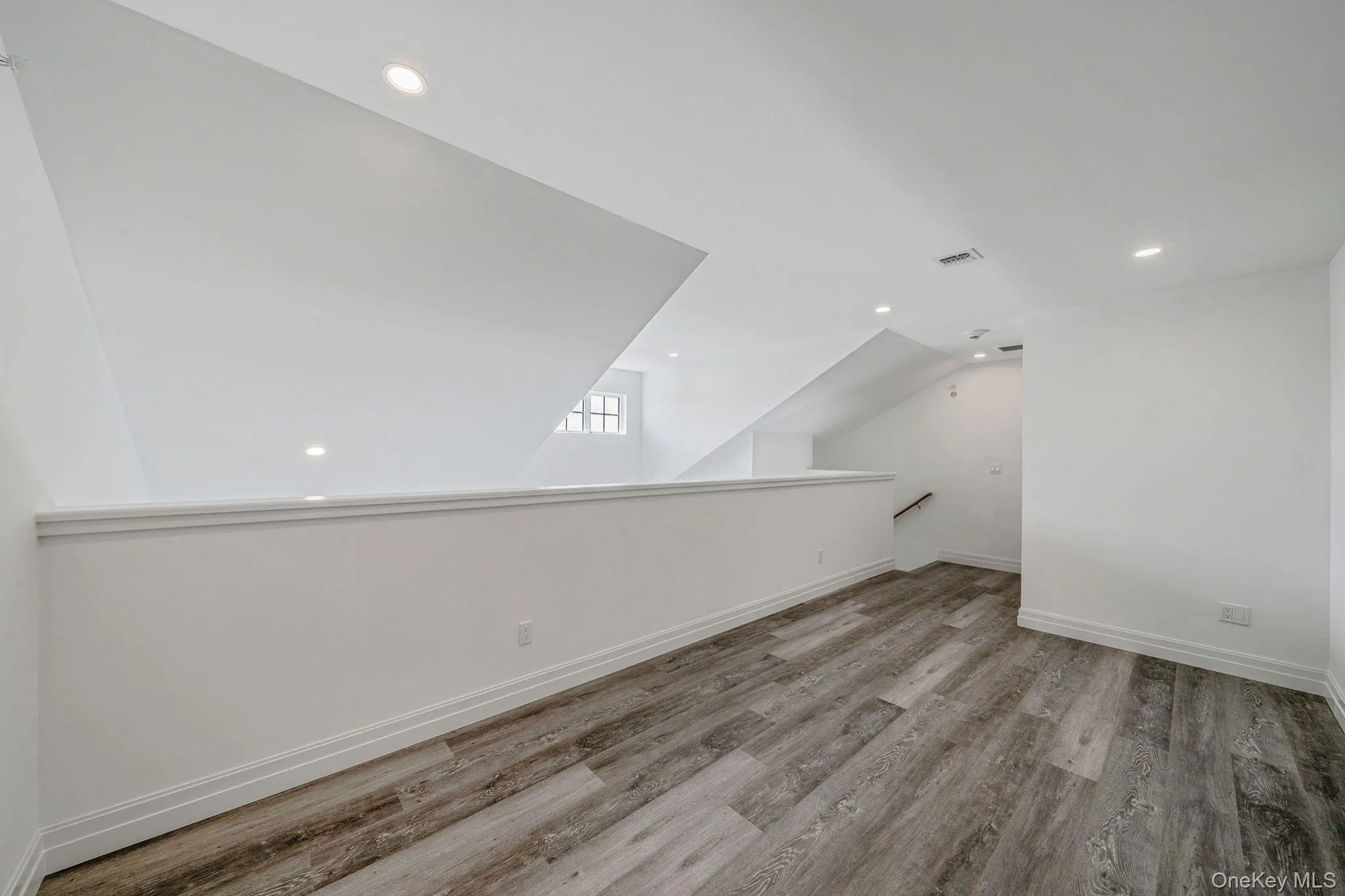 Additional living space featuring recessed lighting and light wood-style floors Additional living space featuring recessed lighting and light wood-style floors