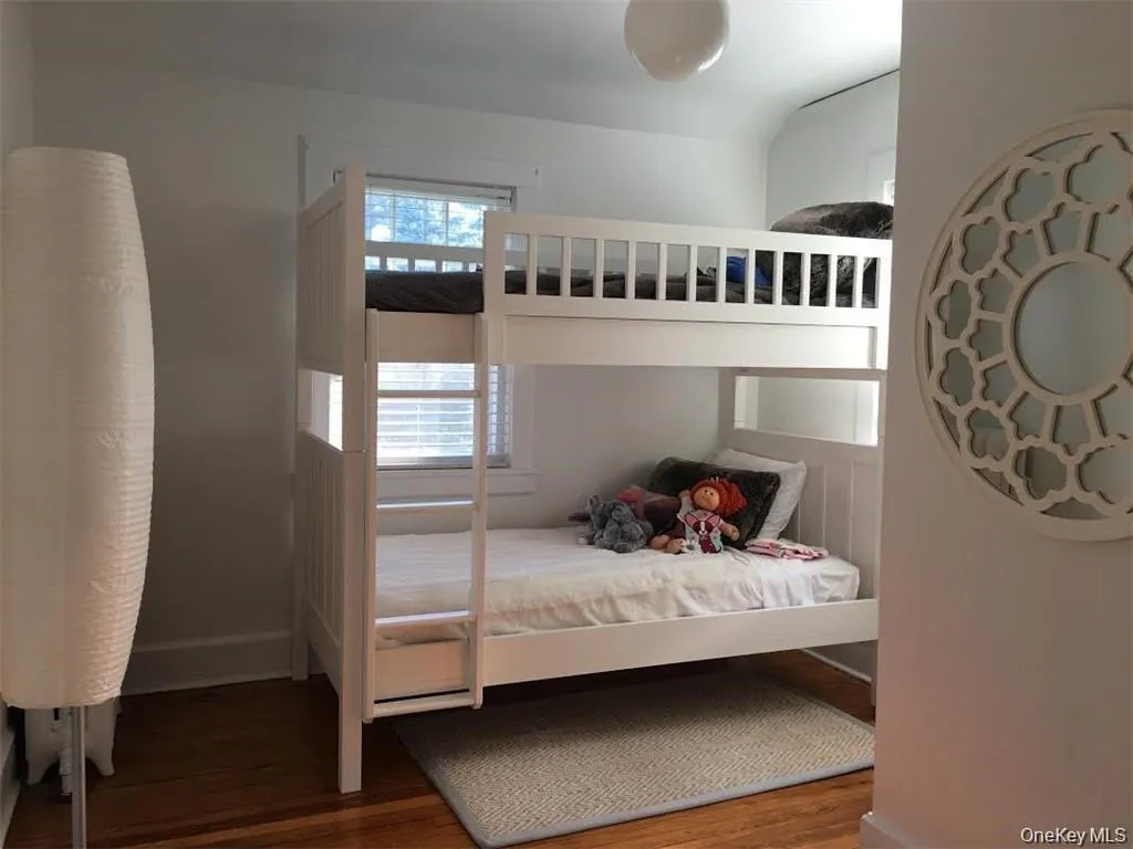 Bedroom with wood finished floors Bedroom with wood finished floors