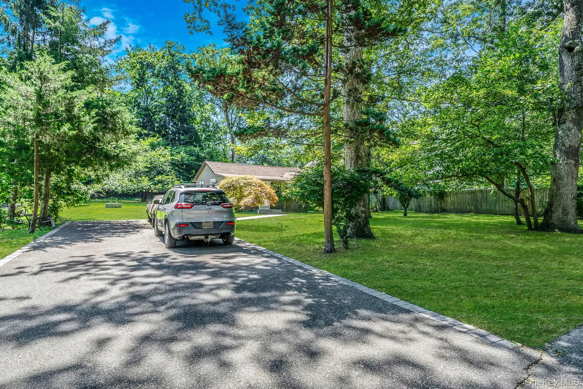 View of front of property with driveway View of front of property with driveway