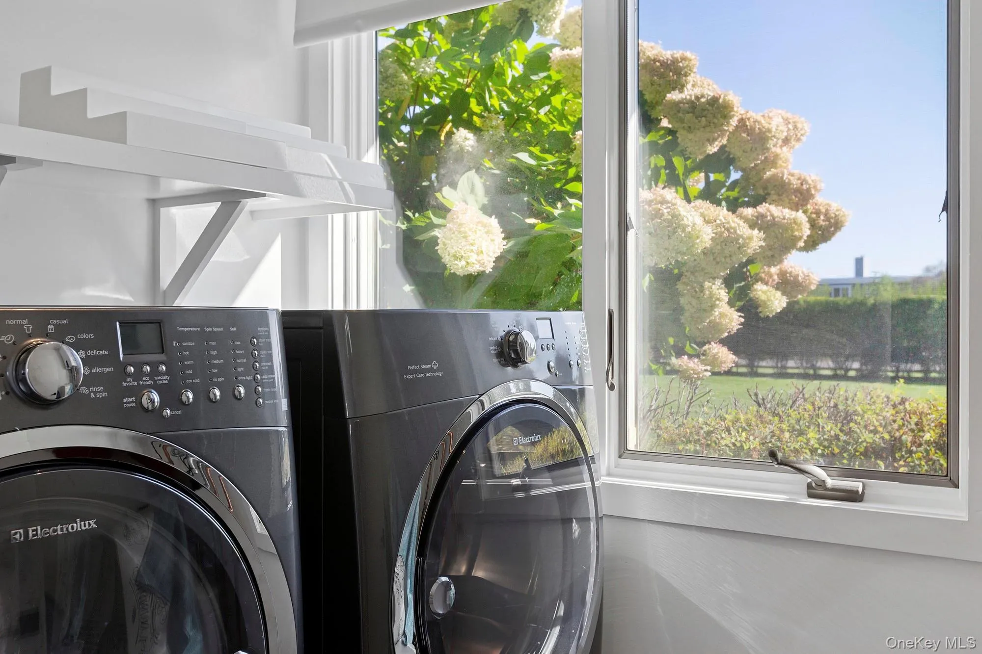 Washroom with separate washer and dryer Washroom with separate washer and dryer