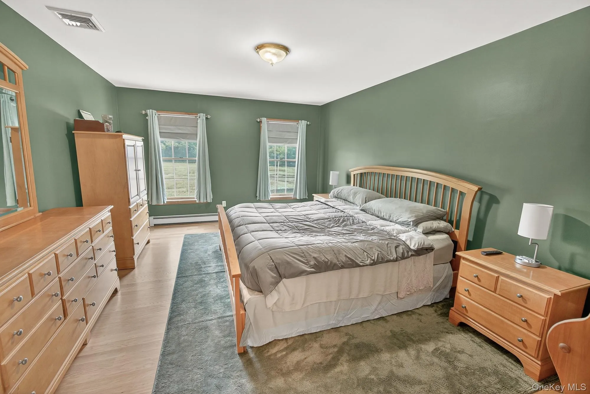 Primary bedroom wood floors Primary bedroom wood floors
