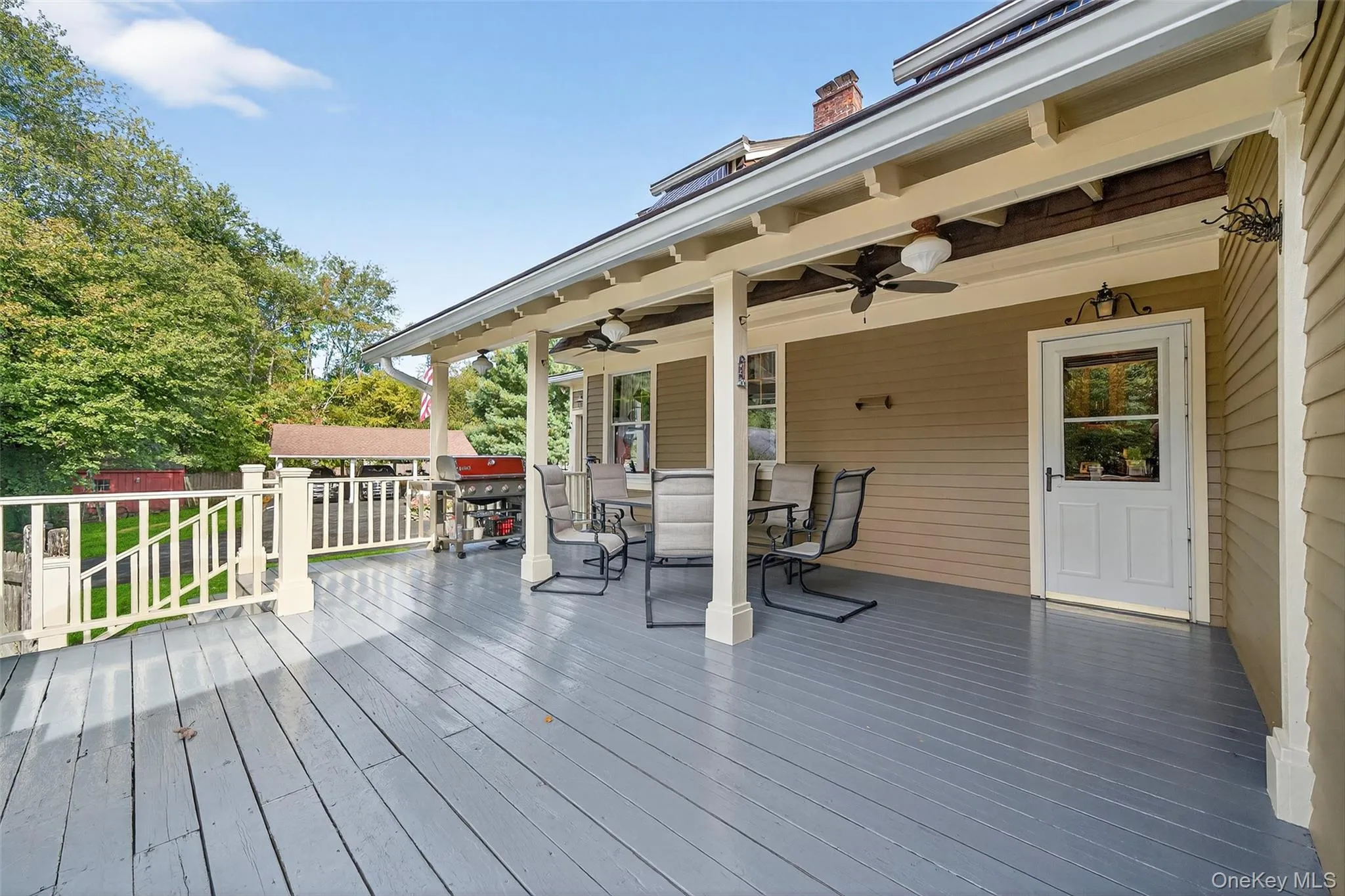 Deck featuring outdoor dining area, a ceiling fan, and grilling area Deck featuring outdoor dining area, a ceiling fan, and grilling area