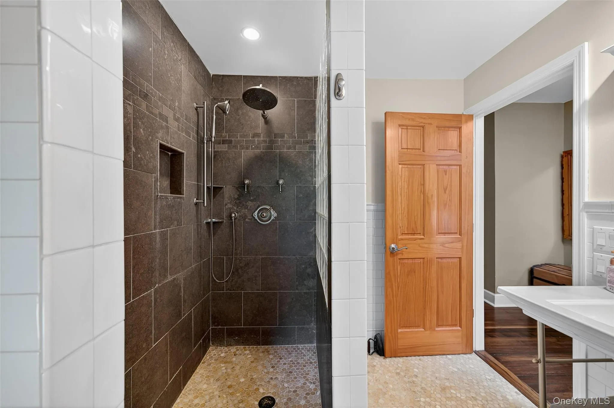 Bathroom featuring a walk in shower and recessed lighting Bathroom featuring a walk in shower and recessed lighting