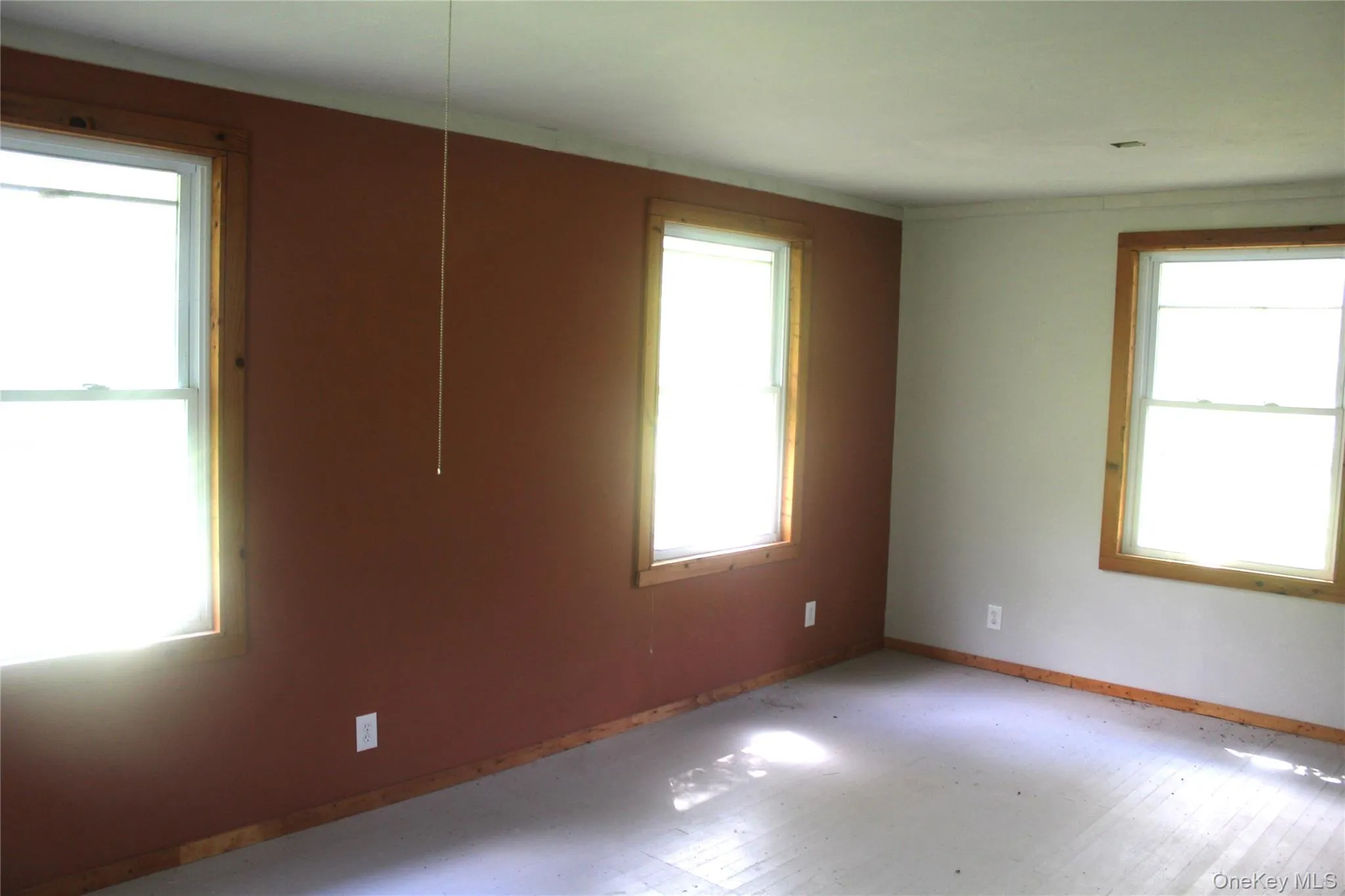 Empty room featuring baseboards Empty room featuring baseboards