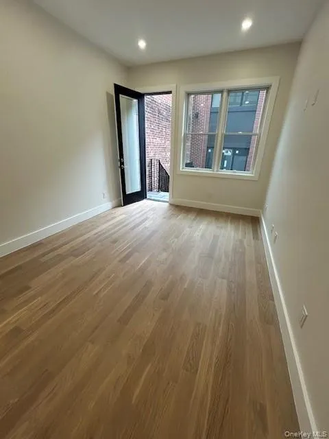 Spare room featuring light wood-type flooring and recessed lighting Spare room featuring light wood-type flooring and recessed lighting