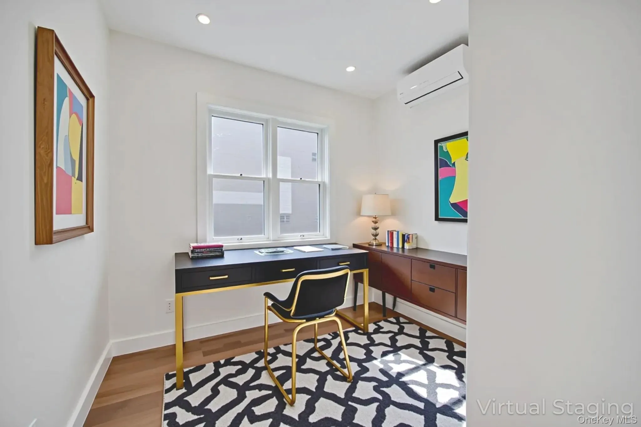 Home office featuring light wood-style flooring, a wall mounted AC, and recessed lighting Home office featuring light wood-style flooring, a wall mounted AC, and recessed lighting