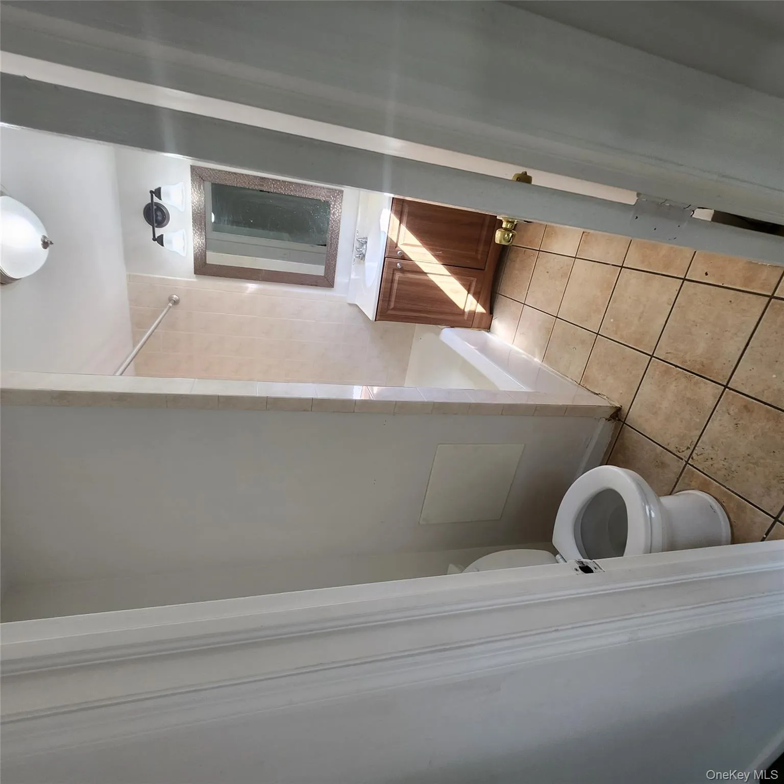 Bathroom with shower / bathtub combination, light tile patterned floors, and vanity Bathroom with shower / bathtub combination, light tile patterned floors, and vanity