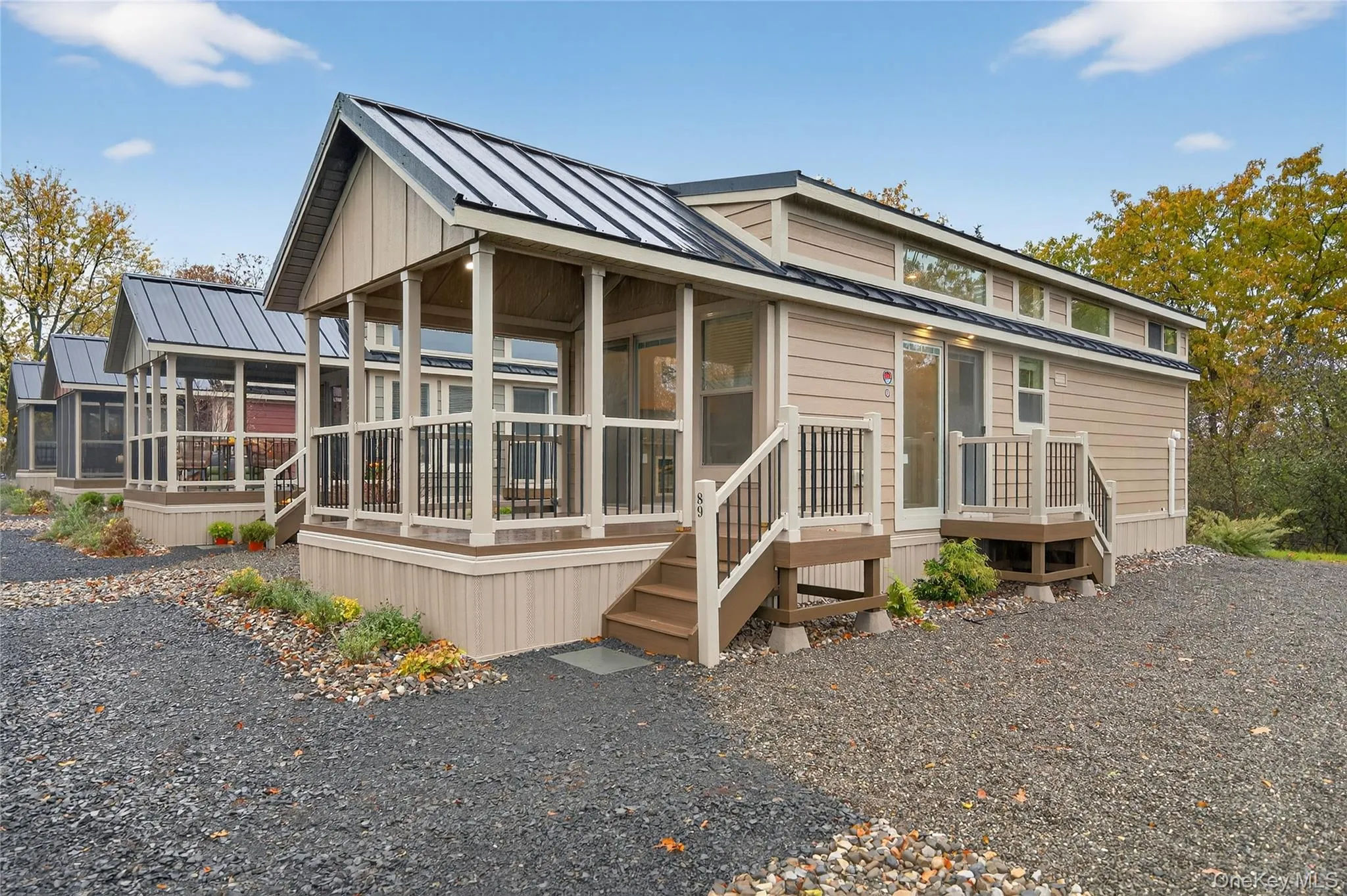 Covered porch, side yard & parking area Covered porch, side yard & parking area