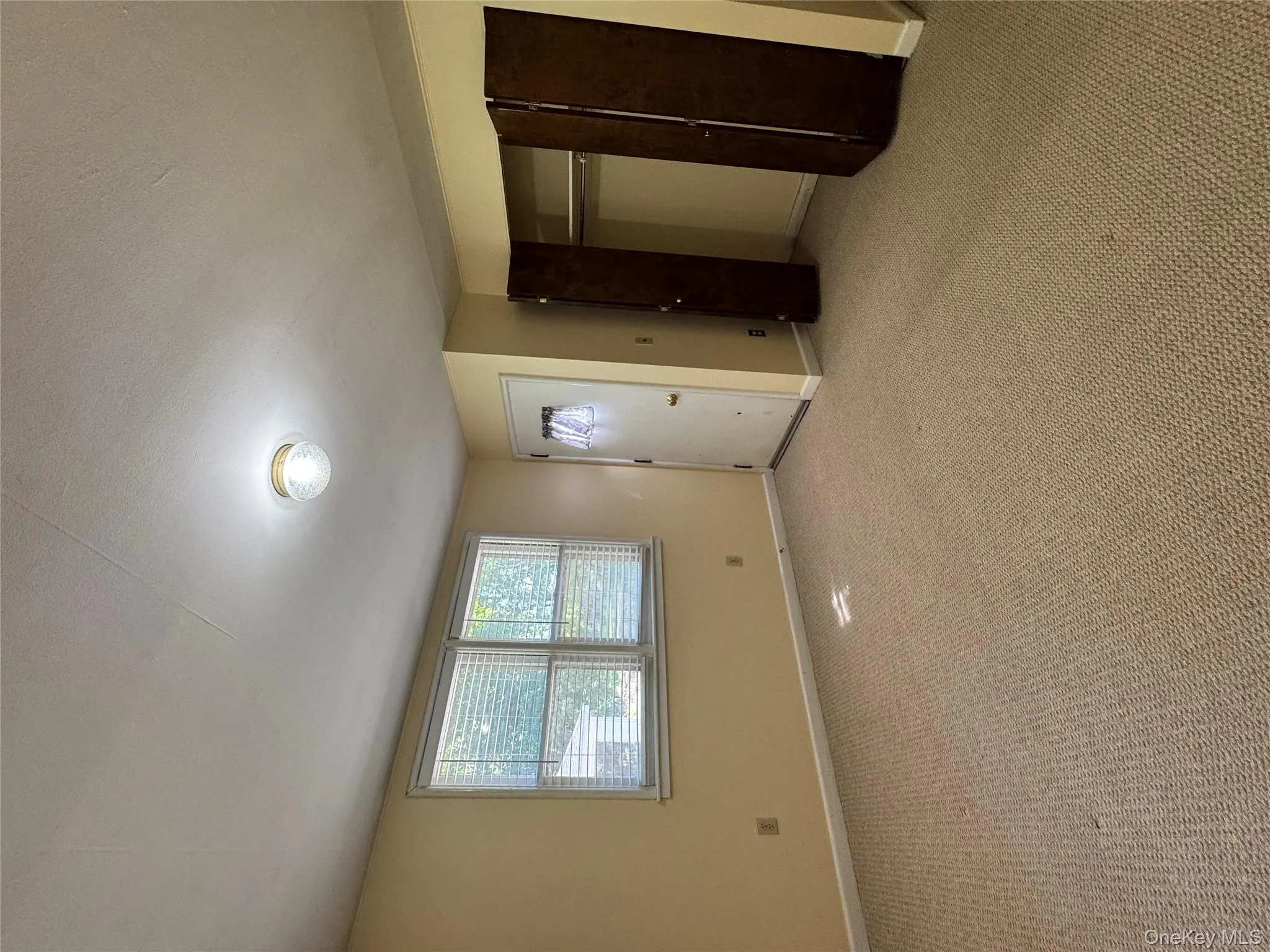 Unfurnished bedroom featuring carpet flooring and a closet Unfurnished bedroom featuring carpet flooring and a closet