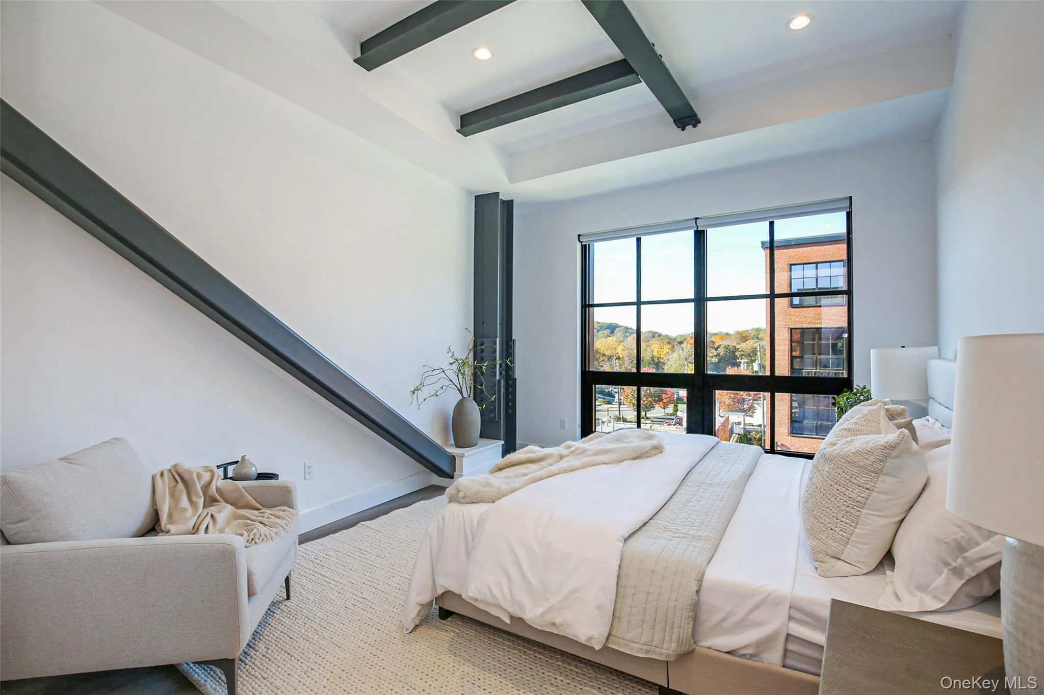 Bedroom featuring beam ceiling Bedroom featuring beam ceiling