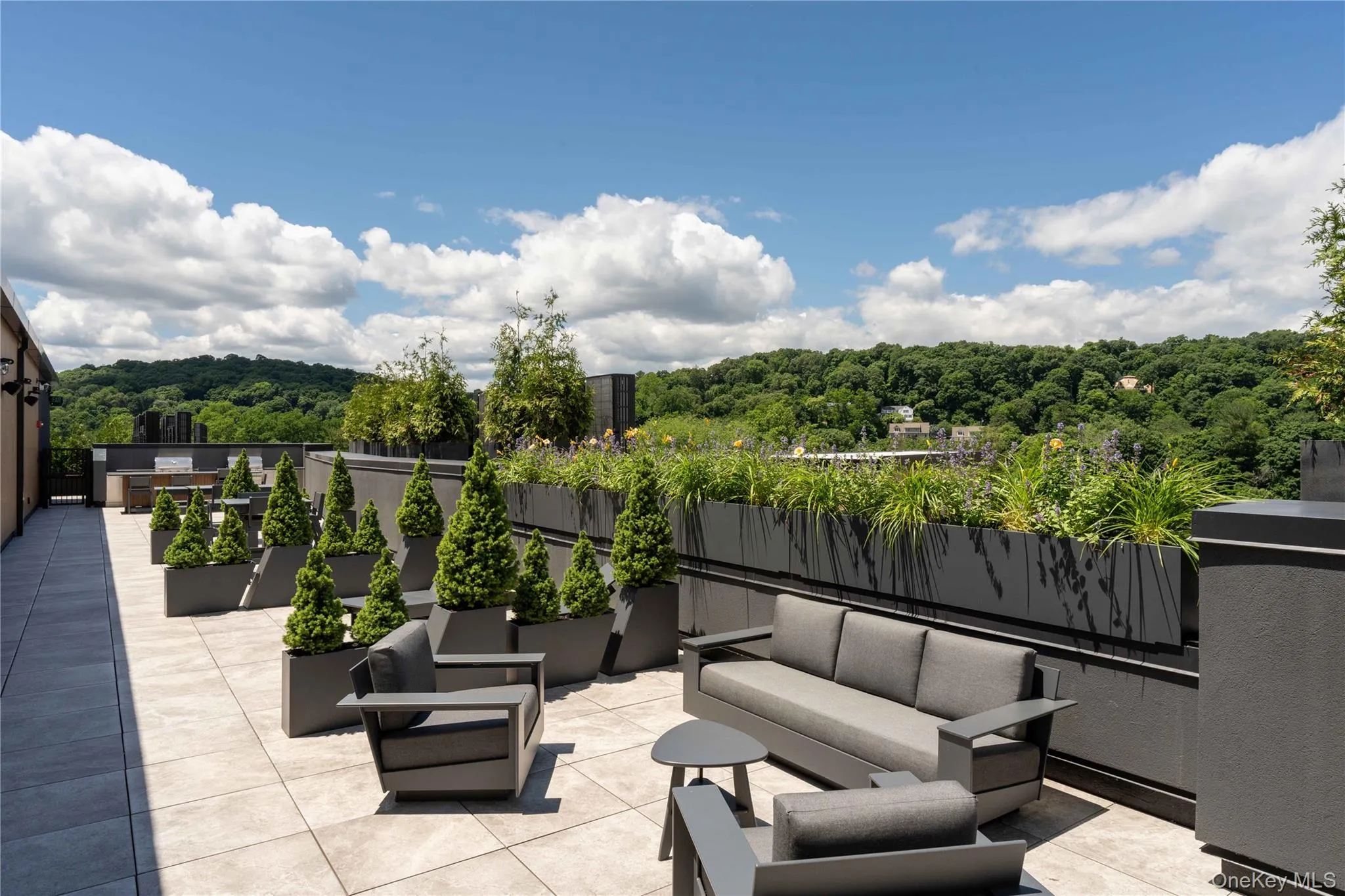 View of roof deck with an outdoor living space View of roof deck with an outdoor living space