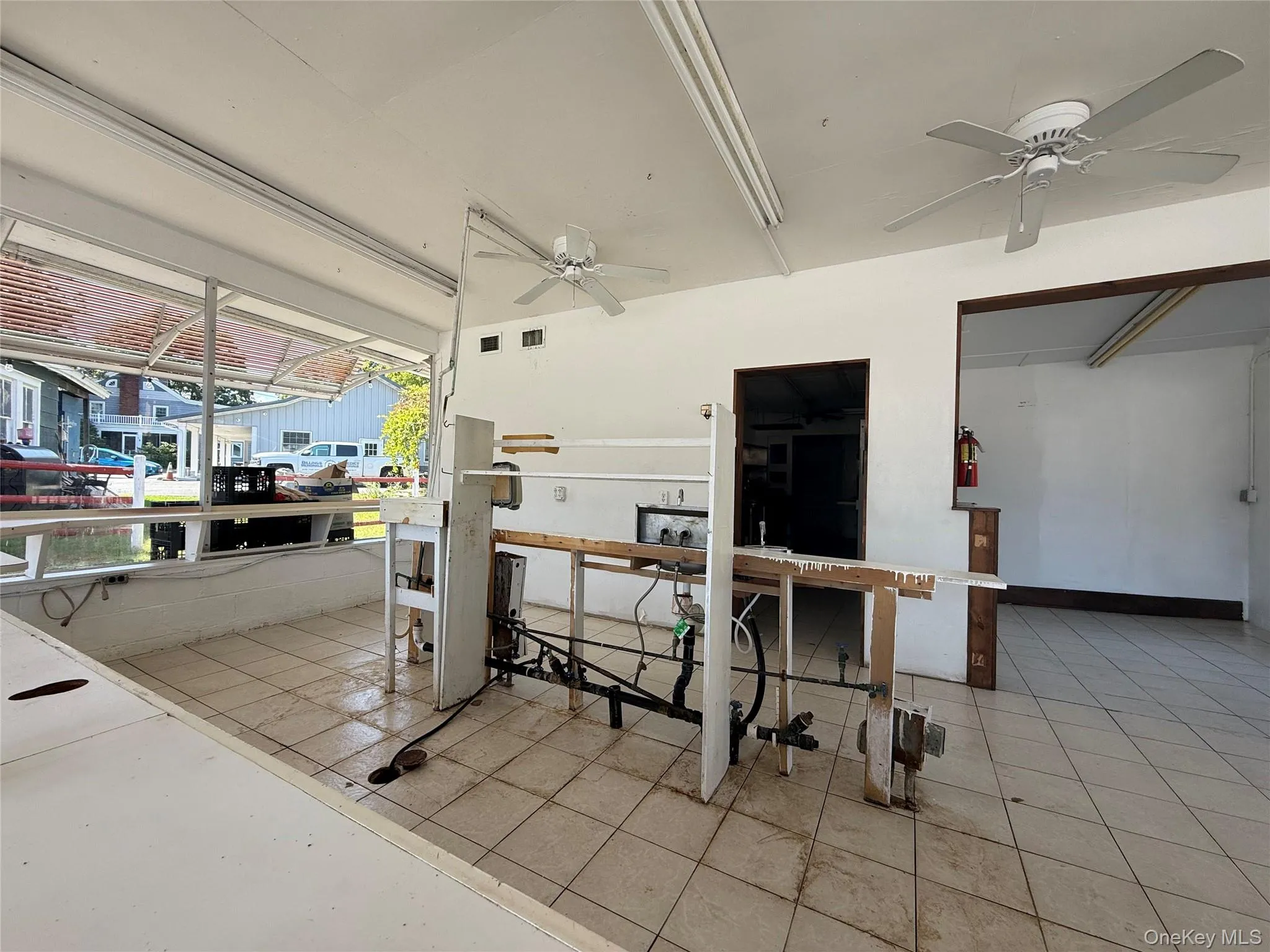 View of patio featuring a ceiling fan View of patio featuring a ceiling fan