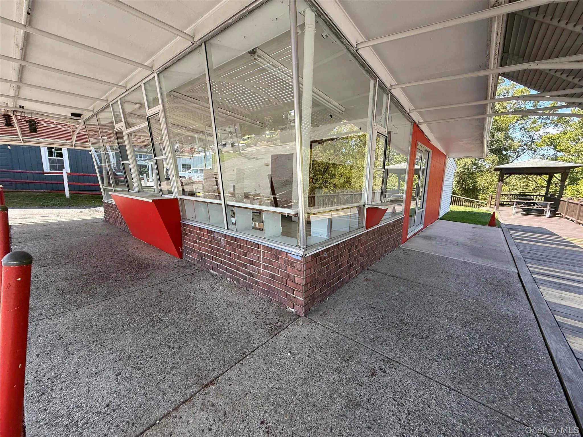 View of home's exterior with a gazebo View of home's exterior with a gazebo