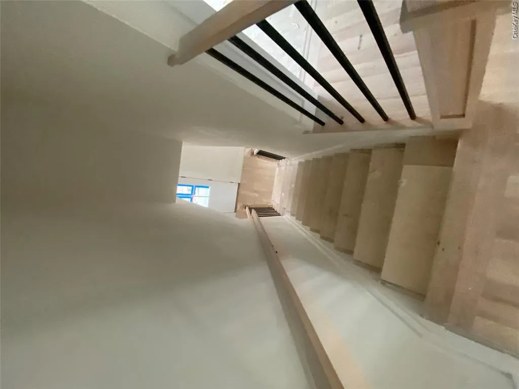 Model Construction Progress Photo. Staircase framed by clean architectural lines, with natural light enhancing the transitions between landings. Model Construction Progress Photo. Staircase framed by clean architectural lines, with natural light enhancing the transitions between landings.