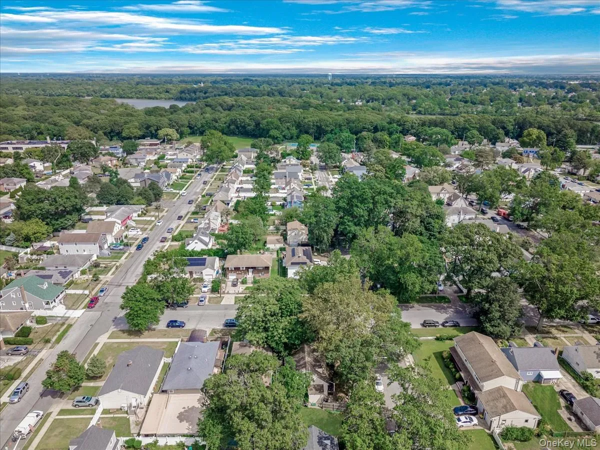 Aerial view of property's location with nearby suburban area Aerial view of property's location with nearby suburban area