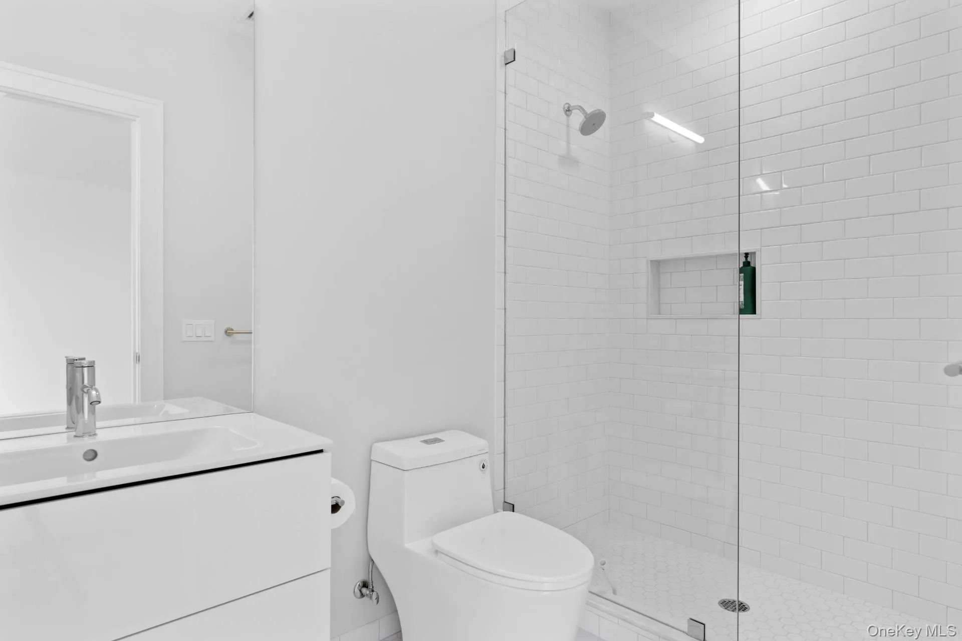 Full bathroom with vanity and a shower stall Full bathroom with vanity and a shower stall