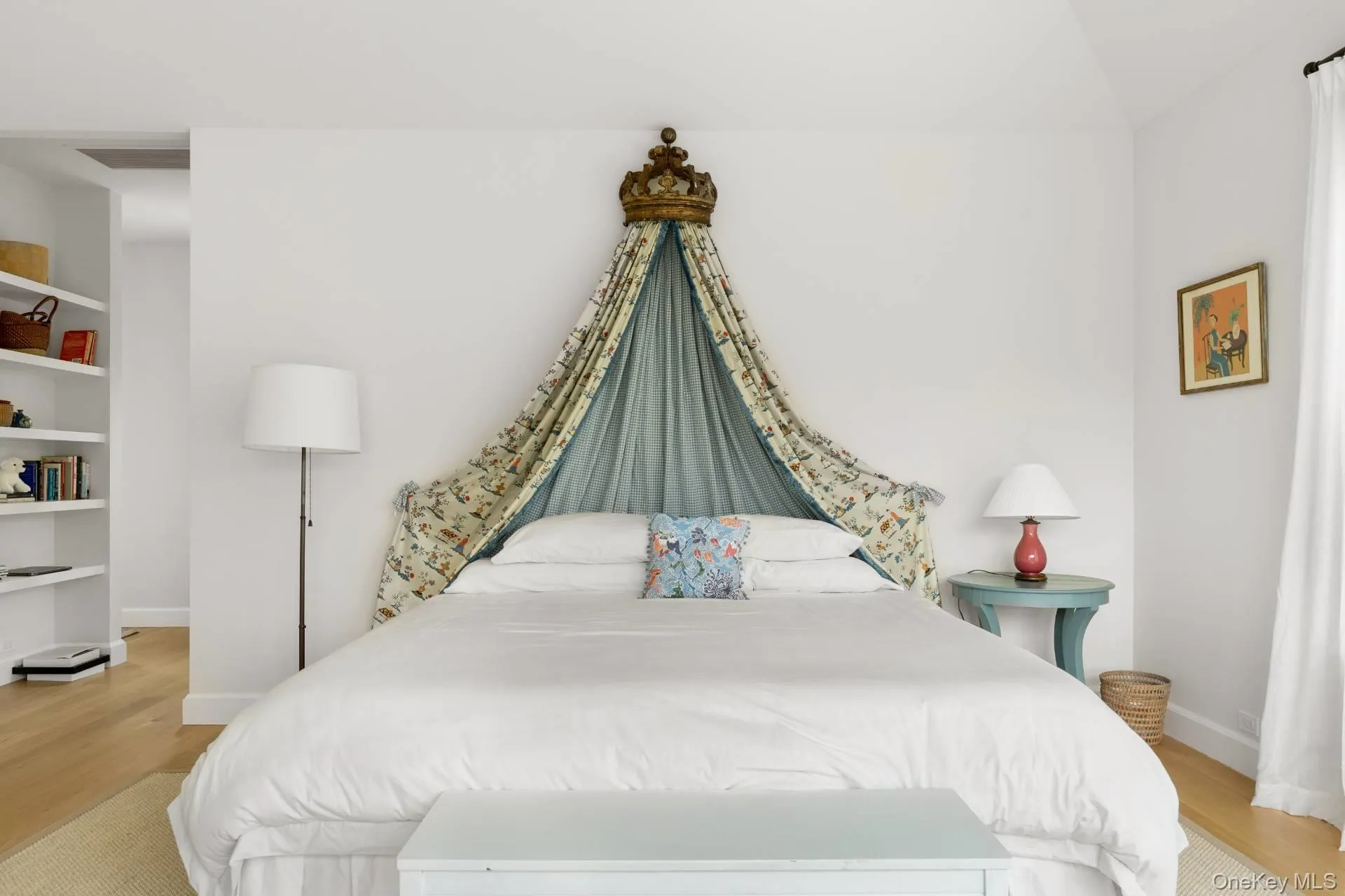 Bedroom with light wood-style floors and baseboards Bedroom with light wood-style floors and baseboards