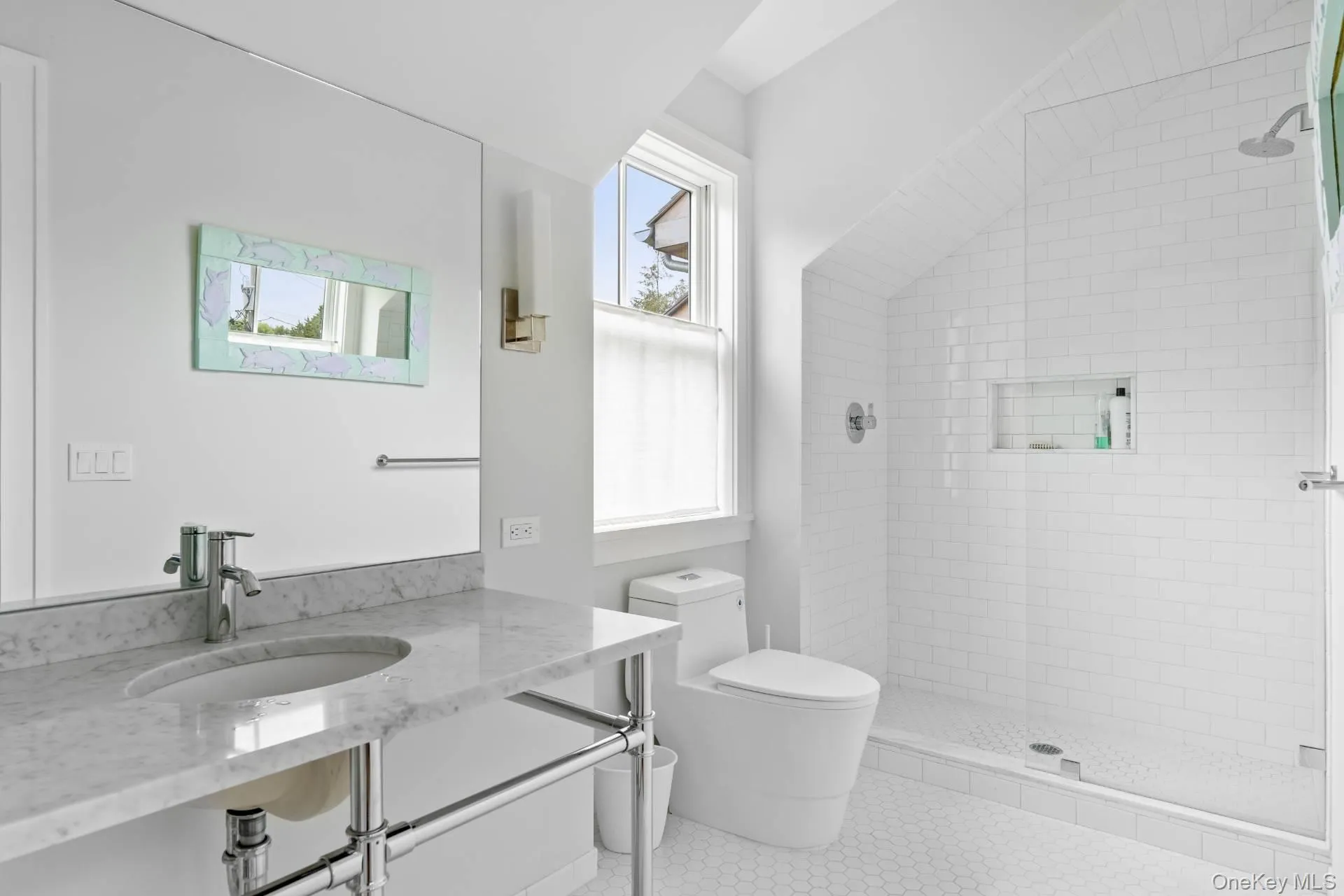 Full bathroom featuring vanity, a stall shower, and light tile patterned floors Full bathroom featuring vanity, a stall shower, and light tile patterned floors