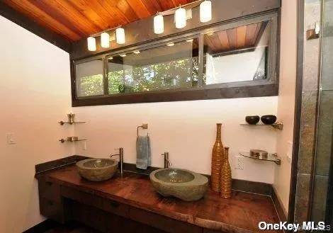 Piamary bath with double-sink vanity & shower. Piamary bath with double-sink vanity & shower.