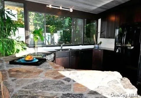 Kitchen with wrap countertop. Kitchen with wrap countertop.