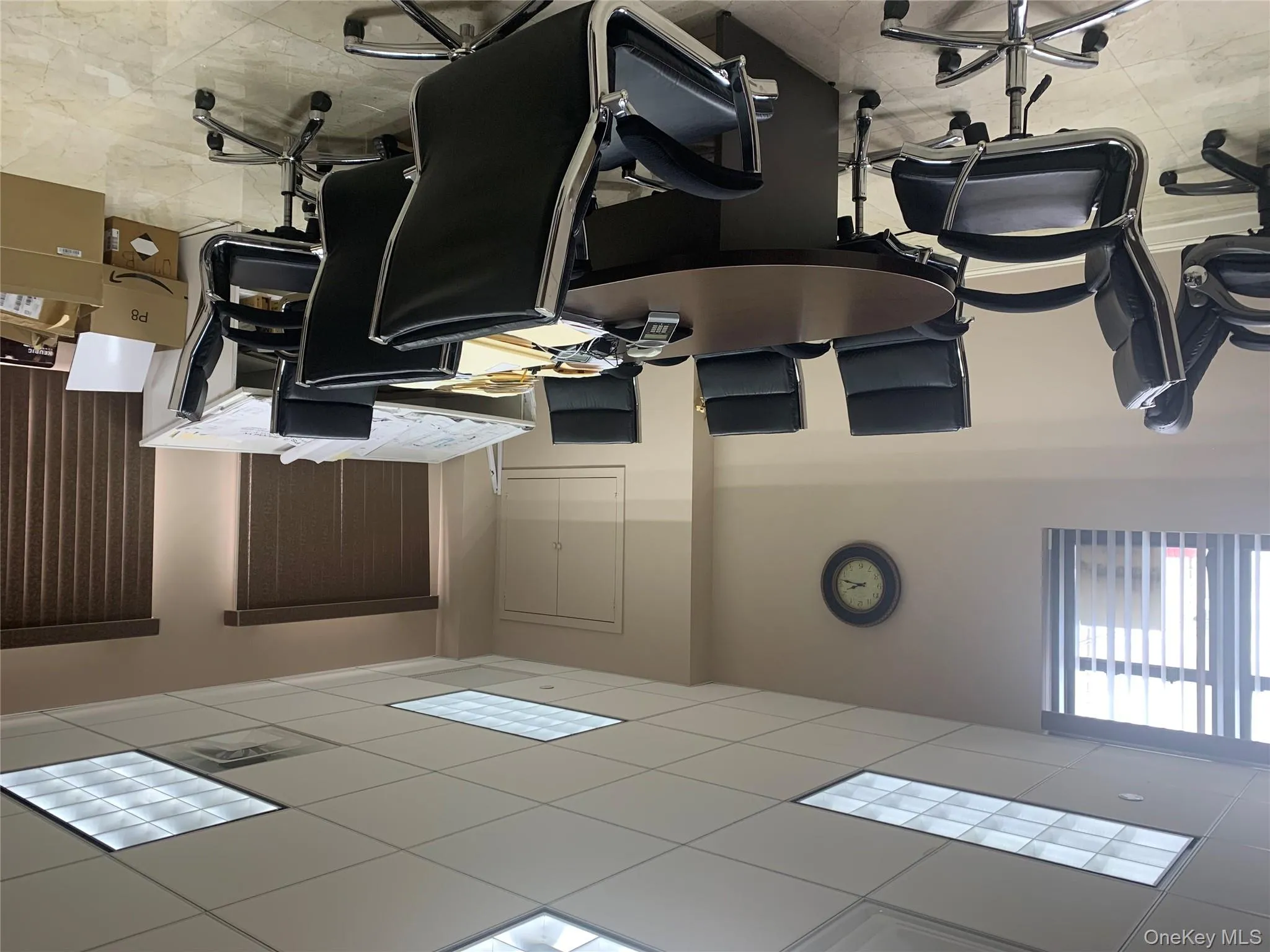 Office area featuring a paneled ceiling Office area featuring a paneled ceiling