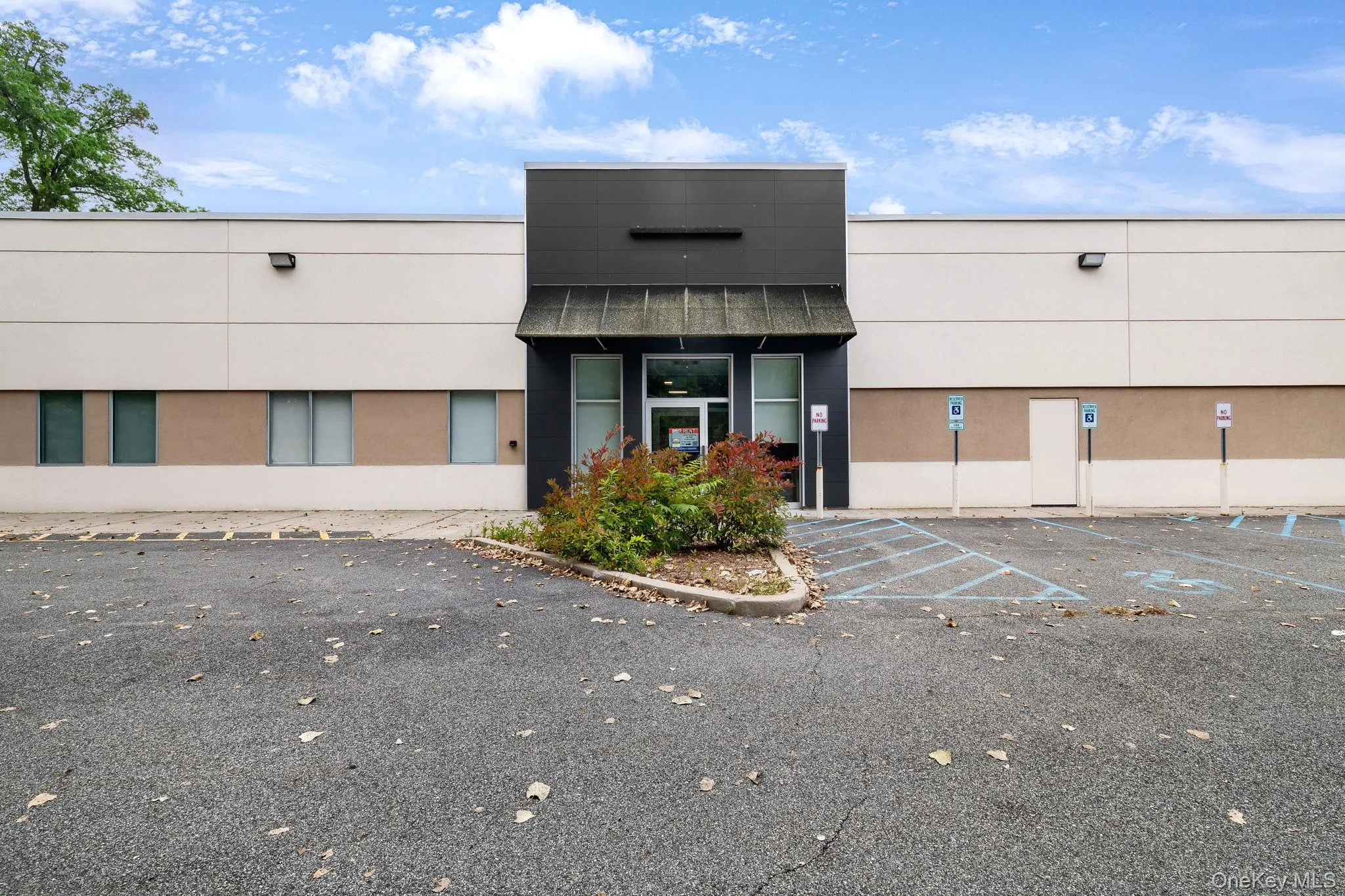 View of commercial property featuring parking View of commercial property featuring parking
