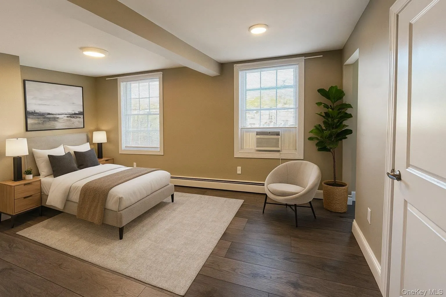 Bedroom featuring beamed ceiling, dark wood finished floors, baseboard heating, and cooling unit Bedroom featuring beamed ceiling, dark wood finished floors, baseboard heating, and cooling unit